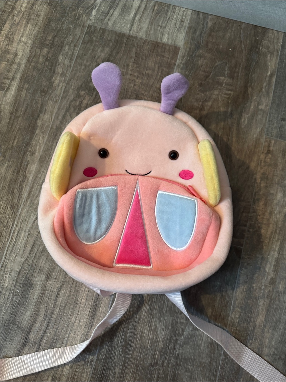 Akoo Plush Bug Backpack in Peach, Pink, Yellow & Purple